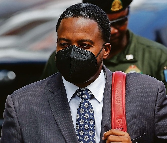 ADRIAN Gibson entering court yesterday. Gibson is facing corruption charges in connection with his tenure as executive chairman of the Water and Sewerage Corporation under the Minnis administration.
Photo: Dante Carrer
