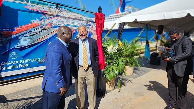 PRIME Minister Philip ‘Brave’ Davis and Fred Smith KC speaking at Grand Bahama Shipyard.