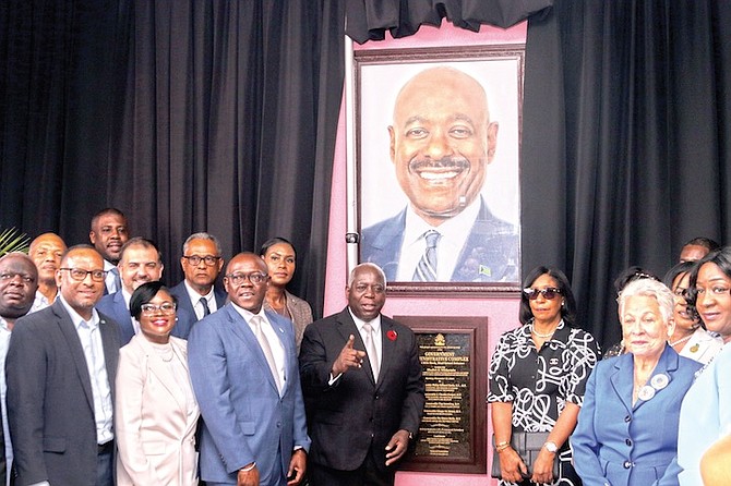 PRIME Minister Philip ‘Brave’ Davis, his cabinet, and the Wilchcombe family are seen at the official unveiling of the plaque in commemoration of the late Obie Wilchcombe at the Administrative Complex in Eight Mile Rock on Monday.
Photos: Vandyke Hepburn
