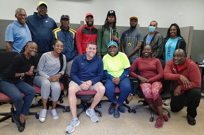 American coach Greg Jack, sitting in front row third from left, is flanked by local coaches participating in the throwers’ clinic. The Bahamas Association of Athletic Coaches (BAAC) is hosting a three-day throwers clinic under the supervision of American coach Greg Jack. BAAC president Corrington Maycock is hoping that the weather will clear up for their outdoor session today at the original Thomas A Robinson Track and Field Stadium.