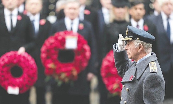 Britain’s King Charles III salutes as he attends the Remembrance Sunday ceremony at the Cenotaph on Whitehall in London, on Sunday, November 12. Photo: Kin Cheung/AP