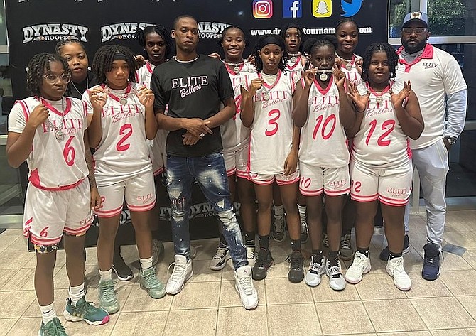 WE ARE THE CHAMPIONS: Elite Ballers girls’ basketball team display their hardware won at the Dynasty Hoops Elite Championship over the weekend in Orlando, Florida.