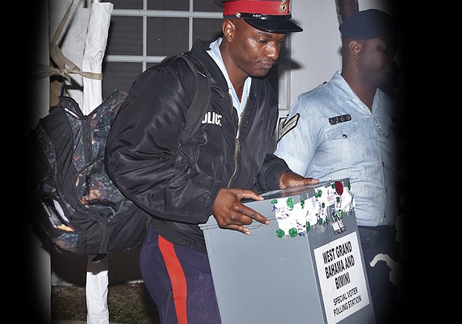 A ballot box being secured on advanced polling day last week. Today, constituents in West Grand Bahama and Bimini cast their votes for who will be their representative in Parliament following the death of Obie Wilchcombe. 
Photo: Vandyke Hepburn