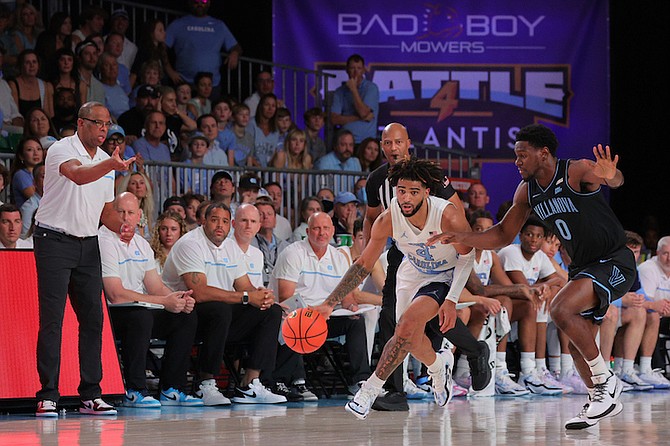 FINAL RUN: The Villanova University Wildcats snuck past the North Carolina Tar Heels in an 83-81 overtime thriller to advance to their third Battle 4 Atlantis finals yesterday at the Imperial Arena, Paradise Island. 
Photos: Dante Carrer