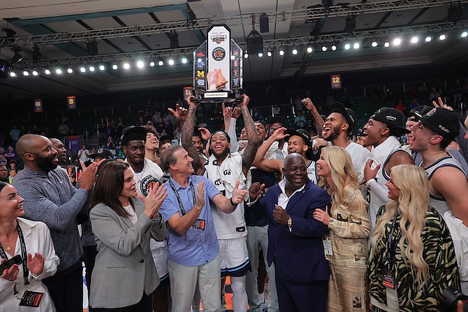 VILLANOVA Wildcats celebrate after adding a third Battle 4 Atlantis title to their collection after
they triumphed 79-63 over the University of Memphis Tigers in the championship game at the
Imperial Arena, Paradise Island, on Friday.
Photo: Dante Carrer