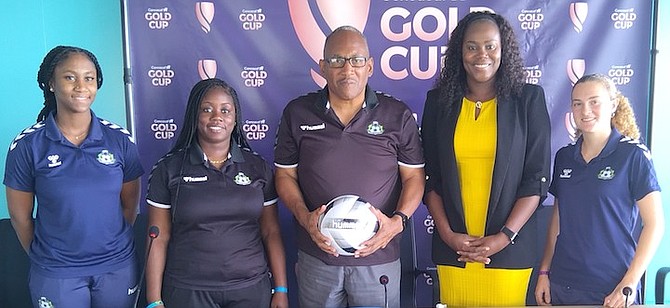 SHOWN, from left to right, are player Rachel Rolle, coach Ricqea Bain, BFA’s deputy secretary general Carl Lynch, director of sports Kelsie Johnson-Sills and player Diane Maillis pose above at yesterday’s press conference.