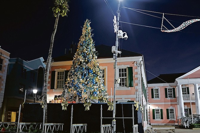 YOUTH, Sports and Culture Minister Mario Bowleg defended the aesthetics of the Christmas tree in Parliament Square yesterday, saying the tree was incomplete during last week’s national tree lighting ceremony.
Photo: Moise Amisial