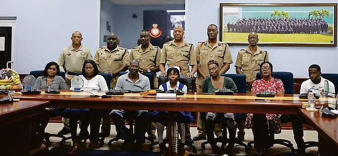 COMMISSIONER Clayton Fernander and his executive team honoured Keyshawn Marshall, Chief Superintendent David Lockhart, Constable Miller, and Margo Adderley for their heroic actions for helping to save Saniyah Penn, 16, from waters near Arawak Cay when a vehicle she was in went overboard and started sinking on October 22.