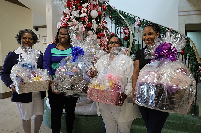 NURSES who helped deliver the first boy and girl of 2024 receive gift baskets.
Photo: Dante Carrer
