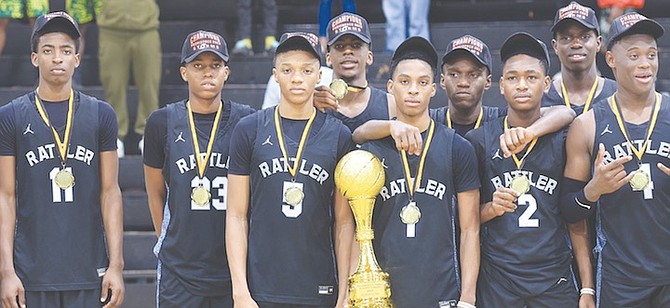 CHAMPIONS: CI Gibson Rattlers senior boys celebrate their Providence Basketball Club’s 24th Yuletide Basketball Classic title on Saturday at the CI Gibson Gymnasium.
Photo: Moise Amisial/Tribune Staff