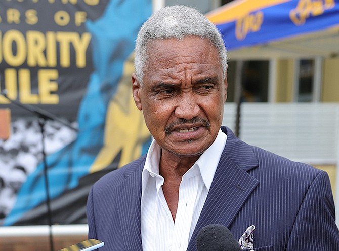 Former Cabinet Minister Leslie Miller speaks to reporters during an event to celebrate Majority Rule at PLP Headquarters on Wednesday. Photo: Dante Carrer