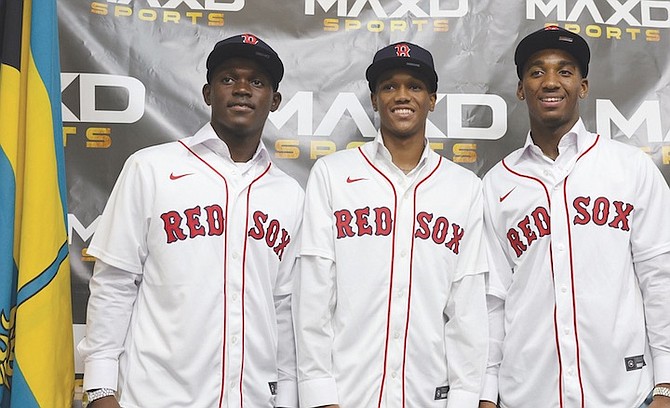 Tavano Baker, Edwin Darville and Trent Wilson have signed with the Boston Red Sox.
Photo by Dante Carrer