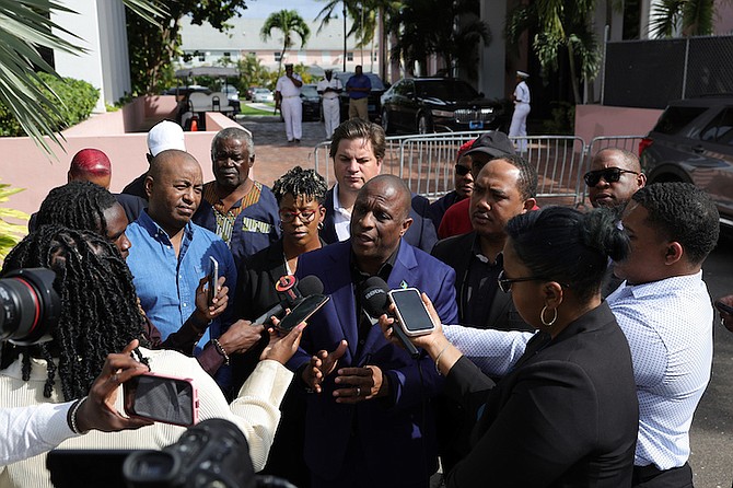 OPPOSITION leader Michael Pintard flanked by Free National Movement deputy leader Shanendon Cartwright, St Anne’s MP Adrian White, former Senator Darren Henfield and other FNM party members and supporters during a press conference at the entrance of the Office of The Prime Minister yesterday. Photos: Dante Carrer