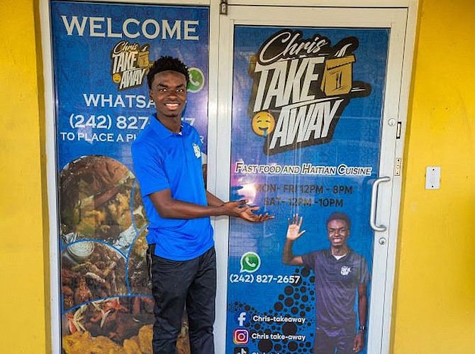 CHRISTOPHER Edouard stands at the door of his newly opened takeaway - Chris’s Takeaway on Fire Trail Road.