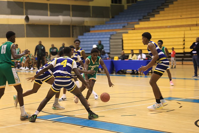 CHAMPS ARE HERE: The 2024 Bahamas Association of Independent Secondary Schools (BAISS) basketball championship matchups are all set. The number one seeds in each division advanced yesterday evening to punch their tickets to the best-of-three championship series. The final round is set to begin on Monday at the Kendal GL Isaacs Gymnasium. Photo: Moise Amisial