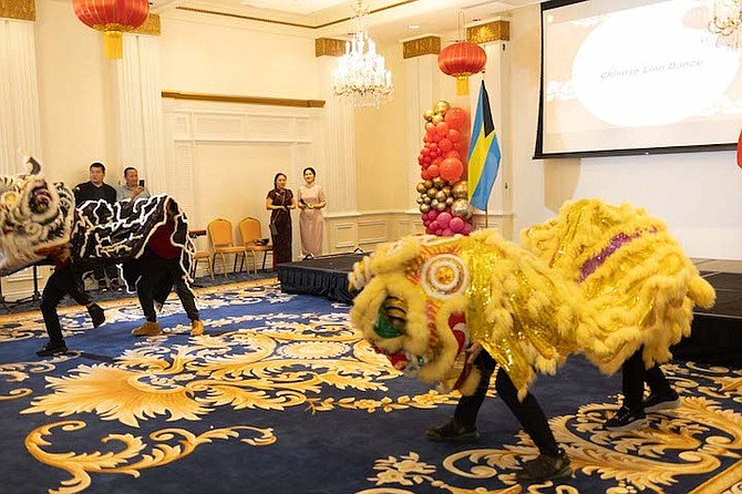 A DANCE of dragons marking the Chinese New Year.
Photos: Moise Amisial