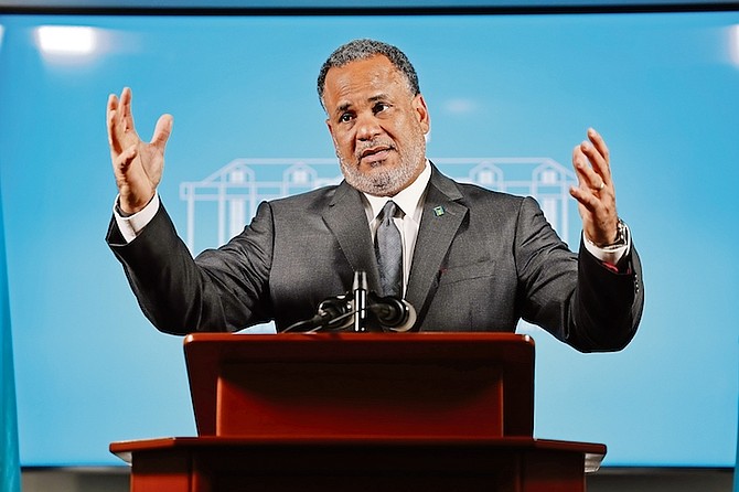 MINISTER of Economic Affairs and leader of government business in the Senate Michael Halkitis
speaks during a media briefing at the Office of The Prime Minister on Friday.
Photo: Dante Carrer