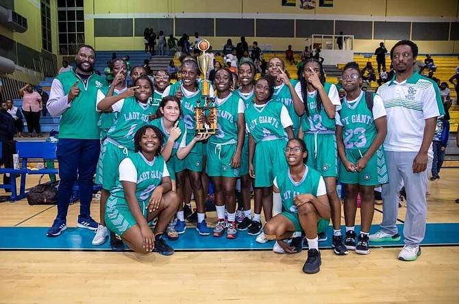 WE ARE THE CHAMPIONS: The St John’s College junior girls, junior boys and senior girls left the Bahamas Association of Independent Secondary Schools (BAISS) basketball championships
with bragging rights in three out of four contested divisions.