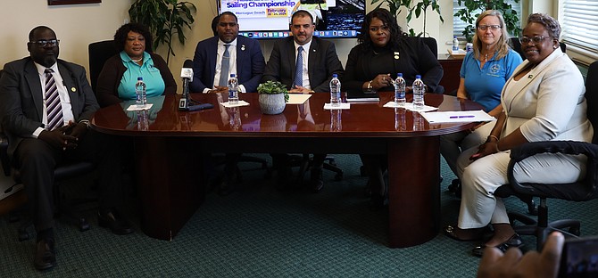 SHOWN, from left to right, are Dwayne Higgins, Cindy Gay, Leonardo Lightbourne, Minister Clay Sweeting, Terrence Bootle, Lori Lowe and Cristain Palacious. Photo: Stephen Hanna