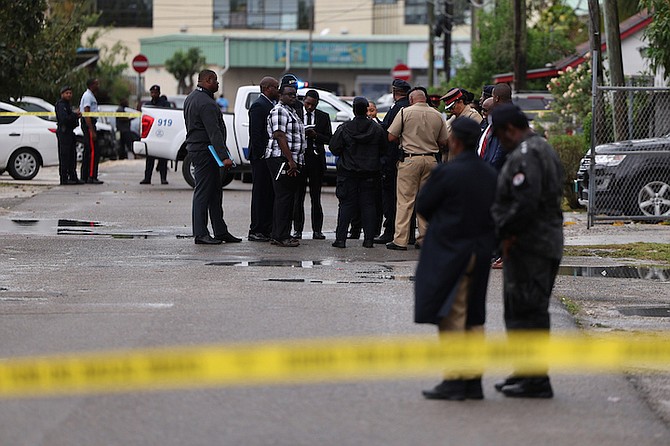 Police at the scene of the shooting on Monday. Photo: Dante Carrer