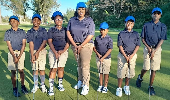 MP Lisa Rahming with some of the aspiring young golfers in the Marathon constituency.