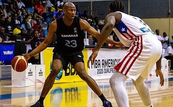 BITTER DEFEAT: The Bahamas men’s senior national basketball team lost to Puerto Rico 86-67 last night in the FIBA 2024 AmeriCup Qualifier at the Kendal Isaacs Gymnasium. NBA free agent Kai Jones dribbles the basketball.
Photo: FIBA Americas