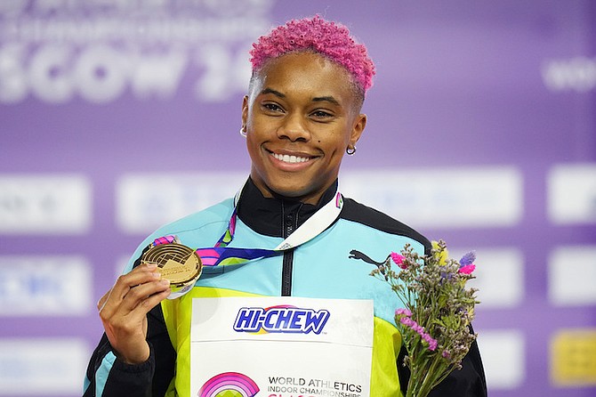 Devynne Charlton on the podium after winning the gold medal in the women's 60 metres hurdles final.
(AP Photo/Petr David Josek)