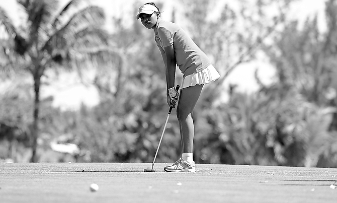 A high school competitor at day one of Bahamas Junior Golf Association’s fourth annual National High School Golf Tournament at the Bahamas Golf Federation’s Driving Range. Photos: Dante Carrer
