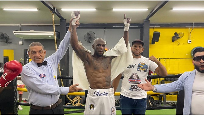 TIME TO CELEBRATE: Bahamian pro boxer Carl Hield defeated Colombia's Fabian Morimon via knockout to win his sixth straight pro bout on Tuesday