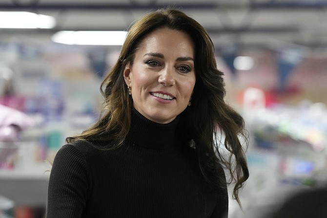 Britain's Kate, Princess of Wales, smiles during her visit to Sebby's Corner in north London, Friday, Nov. 24, 2023. (AP Photo/Frank Augstein, Pool, File )