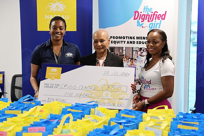 RANFURLY Home brand ambassador Braniska Bullard accepts a donation presented by Nassau Cruise Port (NCP) Regional Marketing Manager Maya Nottage and The Dignified Girl Project Founder Philipa Dean as part of an initiative by the NCP and The Dignified Girl Project on Friday. Photo: Dante Carrer