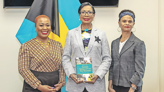 ANN Marie Davis (centre), Spouse of the Prime Minister, was presented with Dr Juliette Storr’s latest book, “Gender Inequality in The Bahamas - Violence, Media and Law”. She is shown with author Dr Storr (right) and Sherrelle Duncombe (left), communication strategist for the D6 Project. Photo: Azaleta Ishmael-Newry