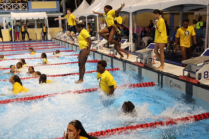 Celebrations from Team Bahamas as they win their sixth straight CARIFTA Swimming Championships. 
Photos: Dante Carrer