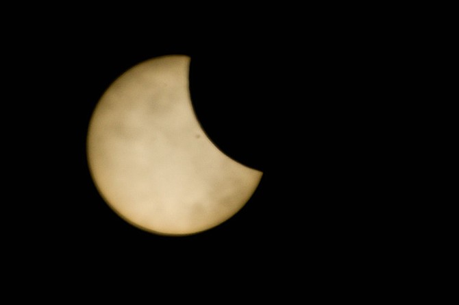 This photo of the partial solar eclipse seen across The Bahamas was captured at 3:50pm in New Providence. Photo: Dante Carrer