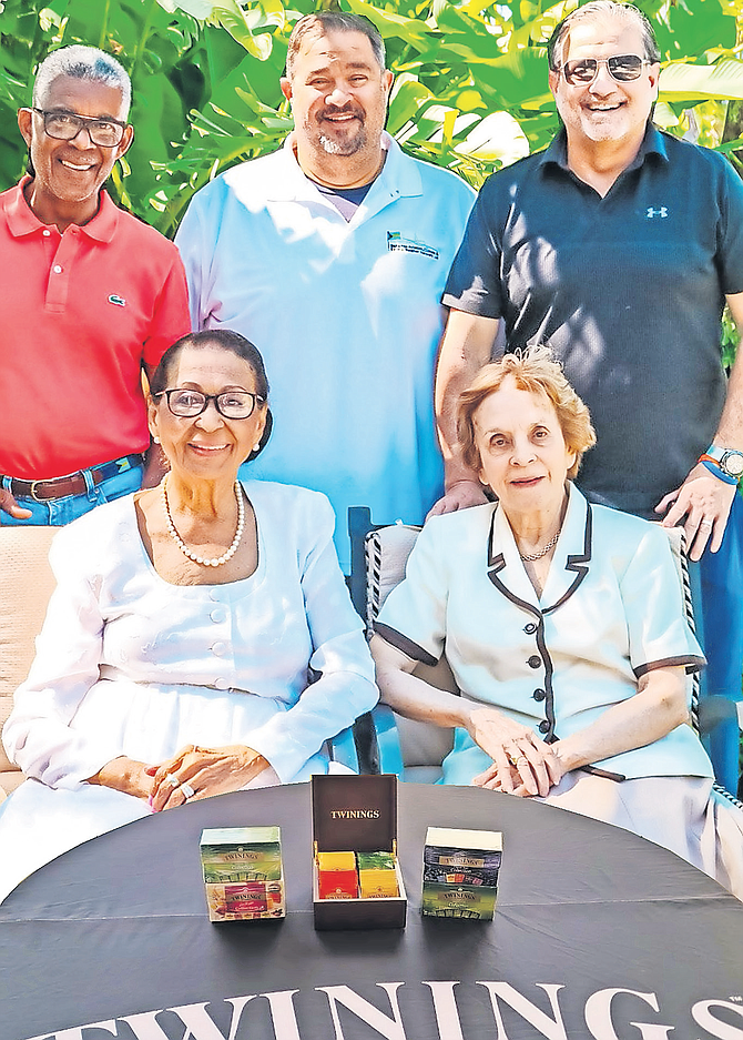 From left, seated, Dame Marguerite Pindling and Rt Hon Eileen Dupuch-Carron, standing, Leslie Pindling, Adam Darville and Robert Dupuch-Carron.