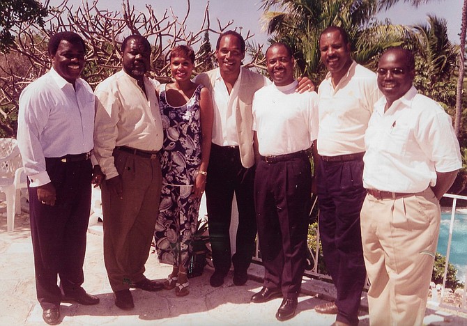 FORMER football star OJ Simpson was a guest at a luncheon hosted by Senate leader Franklyn Wilson at his Eastern Road residence. Also present were (from left) PLP secretary general Calsey Johnson, Senator Elliston Rahming, Magistrate Sherry Wilson, wofe of Mr Wilson, Mr Simpson, PLP chairman Senator Obie Wilchcombe, Mr Wilson, and PLP MP Philip Davis. Photo: Franklyn Wilson