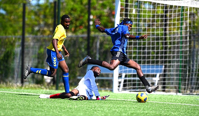 UB midfielder Stanley Grand Pierre beats the BahaJr’s goalkeeper and scores one of his four goals.