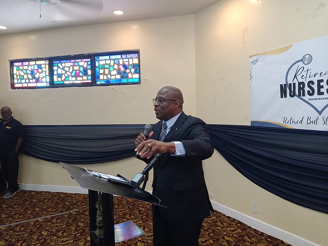 MICHAEL Pintard addressing retired nurses on Grand Bahama on Sunday at the luncheon and installation of officers at Jubilee Cathedral. Mr Pintard also made a financial commitment to the organization. Photos: Denise Maycock