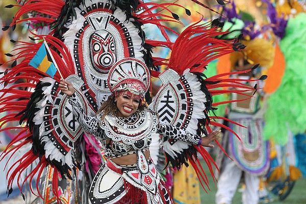 A Junkanoo dancer performs during the opening ceremonies of the IAAF World Relays on Saturday. Photos: Dante Carrer