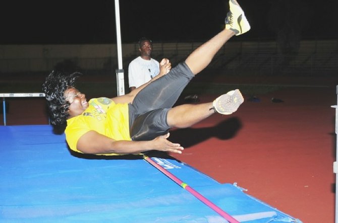 Petty Officer Shari Virgil takes part in the high jump.