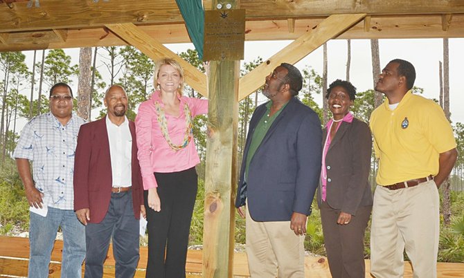 President and CEO of Grand Bahama Power Company and president of Emera Caribbean, Sarah   McDonald officially opened  the new Lucayan National Park  along with some of the invited guests. Pictured (left to right) are Lloyd Cheong, GB BNT chairman; Arthur Jones, GBPA vice president; Sarah McDonald; Eric Carey, executive director of the BNT; Nakeria Wilchcombe, GBPA environmental manager; Philip Pinder, BNT director of finance. Photos: Derek Carroll/Barefoot Marketing


