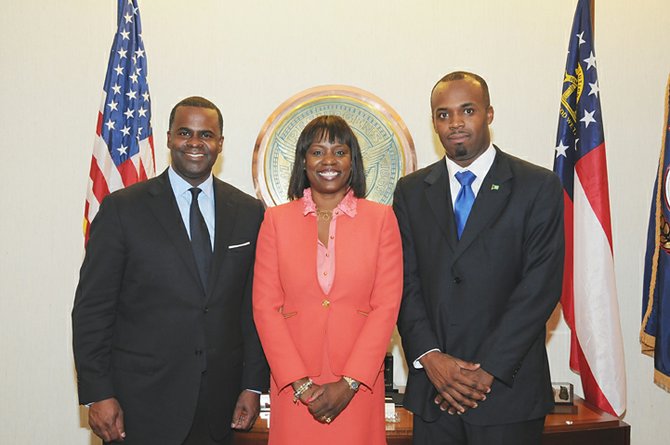 Atlanta Mayor Kasim Reed, Deputy Consul General Monique Vanderpool and Bahamas Consul General Randy E. Rolle.