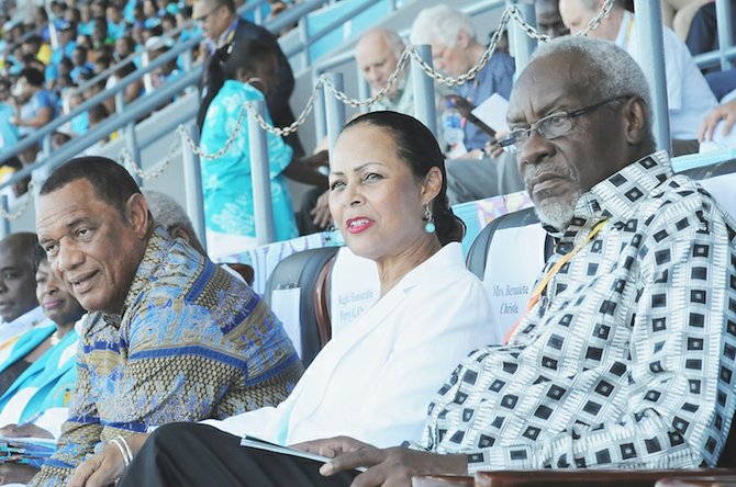 Prime Minister Perry Christie and his wife, Bernadette, watch the action with former Jamaica Prime Minister PJ Patterson.