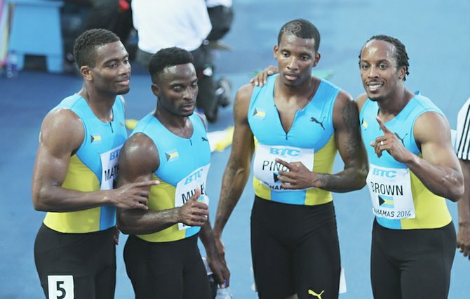 Ramon Miller (second from left) with the 4x400 team.