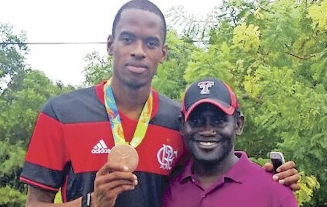 STEVEN GARDINER with coach Anthony Williams in Moore’s Island.