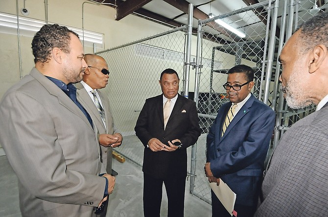 On the tour of the Public Hospitals Authority's new Supply Chain Management Agency on Friday, Prime Minister Perry Christie (centre) was accompanied by Frank Smith, Chairman of the PHA Board of Directors; Herbert Brown, PHA Managing Director; Dr Perry Gomez, Minister of Health; and Dr Glenn Beneby, Chief Medical Officer. Photo: Peter Ramsay/BIS