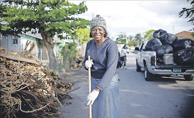 Urban Renewal co-chair Cynthia “Mother” Pratt at a community clean-up initiative in Coconut Grove yesterday. Urban Renewal is set to become an independent authority. 
Photo: Shawn Hanna/Tribune Staff