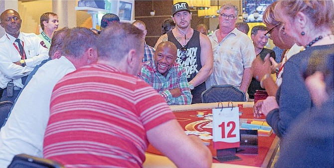 Floyd Mayweather, centre, at the blackjack tournament in Bimini. 