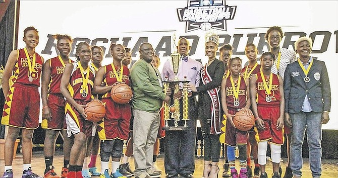 WE ARE THE CHAMPIONS: Jordan Prince William Lady Falcons routed Doris Johnson Mystic Marlins 52-30 last night to win the national basketball title.
                                                                                                                                                                                                                                                                               Photo: 10thYearSeniors
