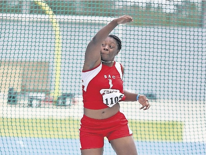 A SAC student competes in the discus during the 28th National High School Track & Field Championships at Thomas A Robinson National Stadium.
Photo: Terrel W Carey/Tribune Staff